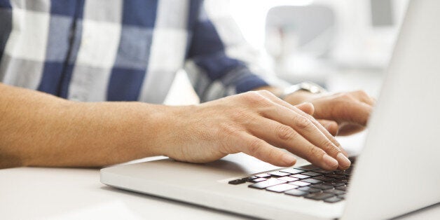 Man using laptop computer