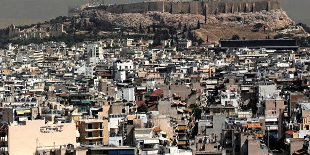 TO GO WITH AFP STORY IN FRENCH BY CATHERINE BOITARD --- (FILES) This photo taken on June 19, 2008 shows a panoramic view of central Athens which has one of the lowest ratios of green space per resident in Europe. Fed up with the dwindling amount of space in the Greek capital, a number of citizen groups have lately stepped up activities to create or defend park areas. AFP PHOTO / Louisa Gouliamaki (Photo credit should read LOUISA GOULIAMAKI/AFP/Getty Images)