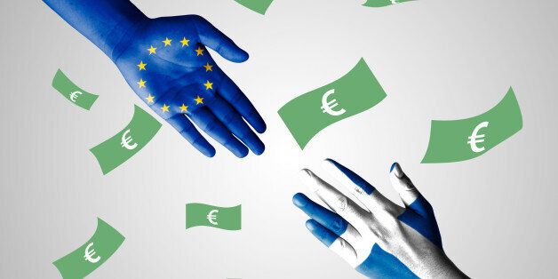 Flag of European Union and Greece painted on hand with Euro background - International cooperation concept
