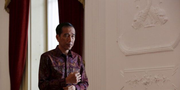 Indonesian President Joko Widodo waits inside the presidential palace before a meeting in Jakarta, Indonesia March 15, 2016. REUTERS/Darren Whiteside