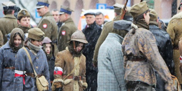 WARSAW, POLAND - 2016/03/01: Children dressed in different army style clothing from different era in Polish history march in front of the former communist detention center of the Ministry of Public Security (SB) in Warsaw, Poland. During the ceremony in front of the detention center, Polish President, Andrzej Duda laid flowers by a memorial commemorating all political prisoners who were tortured and murdered during the communist era in Poland. The memorial was part of the National Day of Remembrance Soldiers accursed. The National Day of Remembrance is for Polish soldiers, who were part of the anti-communist and independence underground. It was adopted in 2001, when the Polish parliament decided that, It recognized the merits of organizations and groups for independence, which after the Second World War, decided to take up the unequal struggle for sovereignty and independence of Polish, giving thus a tribute to the fallen and murdered and all the imprisoned and persecuted organization Freedom and Independence. (Photo by Anna Ferensowicz/Pacific Press/LightRocket via Getty Images)