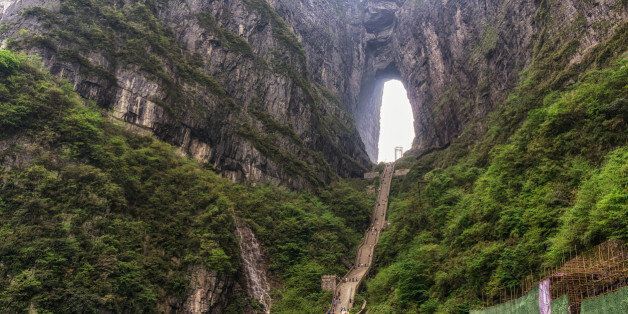 tianmen cave or heavens door. a large water eroded hole between the two peaks. Taken in tianmen mountain national park in zhangjiajie, china