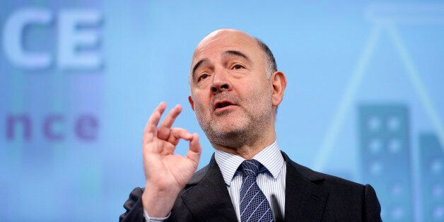 European Economic and Financial Affairs Commissioner Pierre Moscovici gestures during a news conference on the tax avoidance package at the EU Commission's headquarters in Brussels, Belgium, January 28, 2016. REUTERS/Francois Lenoir