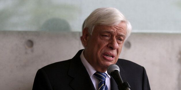 President of Greece, Prokopis Pavlopoulos, delivers a statment at the end of his visit on March 30, 2016 to the Yad Vashem Holocaust Memorial museum in Jerusalem commemorating the six million Jews killed by the German Nazis and their collaborators during World War II. / AFP / GALI TIBBON (Photo credit should read GALI TIBBON/AFP/Getty Images)