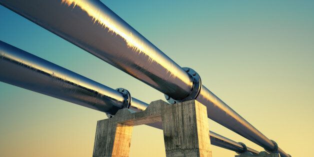 Bottom shot of a pipeline at sunset. Pipeline transportation is most common way of transporting goods such as Oil, natural gas or water on long distances.