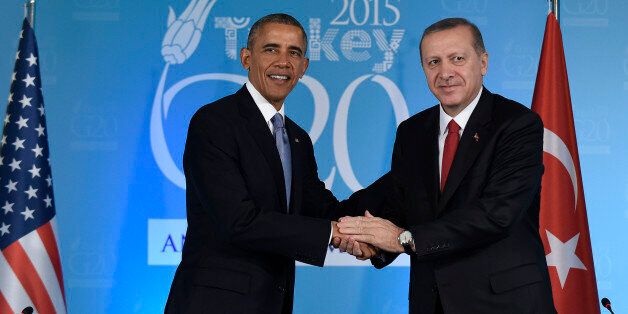 U.S President Barack Obama shakes hands with Turkeyâs President Recep Tayyip Erdogan in Antalya, Turkey, Sunday, Nov. 15, 2015. Obama is attending the G-20 Summit while on a nine-day foreign trip that also includes stops in the Philippines and Malaysia for other global security and economic summits. (AP Photo/Susan Walsh)