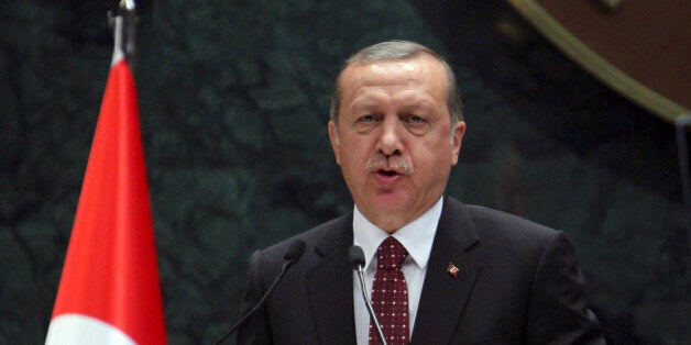 President of Turkey Recep Tayyip Erdogan delivers a speech during a ceremony of Turkey's main private sector organisation, the Union of Chambers and Commodity Exchanges of Turkey (TOBB), in Ankara, on May 10, 2016. / AFP / ADEM ALTAN (Photo credit should read ADEM ALTAN/AFP/Getty Images)