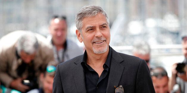 Actor George Clooney poses for photographers, during a photo call for the film Money Monster at the 69th international film festival, Cannes, southern France, Thursday, May 12, 2016. (AP Photo/Thibault Camus)
