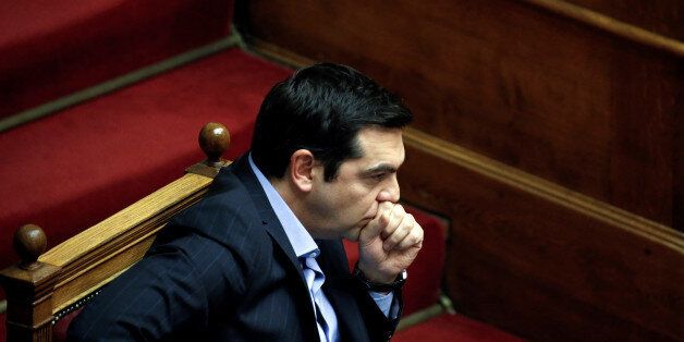 Greek Prime Minister Alexis Tsipras attends a parliamentary session before a vote of tax and pension reforms in Athens, Greece, May 8, 2016. REUTERS/Alkis Konstantinidis