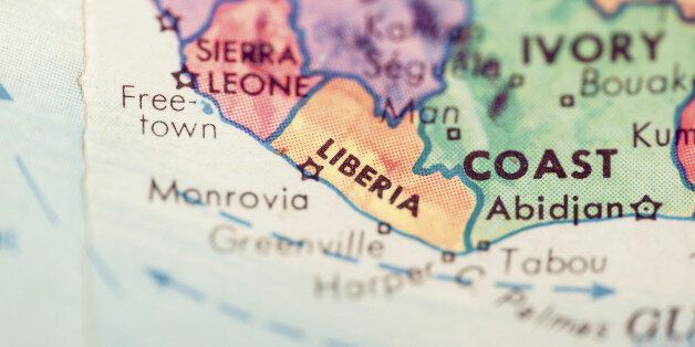 Studying Geography - Liberia on retro globe.