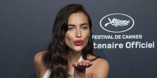 Model Irina Shayk poses during a photocall ahead of the Chopard Gold Party during the 68th Cannes Film Festival in Cannes, southern France, May 18, 2015. Picture taken May 18, 2015. REUTERS/Yves Herman