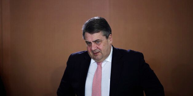 Germany's Vice Chancellor, Economy Minister and Social Democratic Party, SPD, chairman Sigmar Gabriel arrives for the weekly cabinet meeting at the chancellery in Berlin, Wednesday, Feb. 17, 2016. (AP Photo/Markus Schreiber)