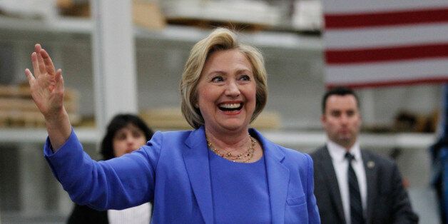 LOUISVILLE, KY - MAY 15: Democratic presidential candidate Hillary Clinton waves to the crowd during a campaign stop at the Union of Carpenters and Millwrights Training Center May 15, 2016 in Louisville, Kentucky. Clinton is preparing for Kentucky's May 17th primary. (Photo by John Sommers II/Getty Images)
