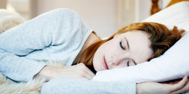 woman asleep in bed