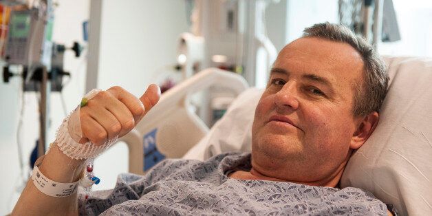 In this May 13, 2016 photo provided by Massachusetts General Hospital, Thomas Manning gives a thumbs up after being asked how he was feeling following the first penis transplant in the United States, in Boston. The organ was transplanted from a deceased donor. (Sam Riley/Mass General Hospital via AP) MANDATORY CREDIT
