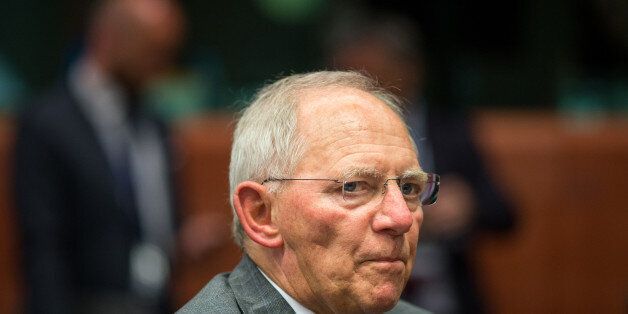 Wolfgang Schaeuble, Germany's finance minister, looks on during a meeting of European finance ministers in Brussels, Belgium, on Monday, May 11, 2015. Greece's Finance Minister Yanis Varoufakis said he is counting on a Monday meeting with his euro-area counterparts in Brussels to establish a 'good paving stone' toward the release of the loans his country is seeking to avert a default. Photographer: Jasper Juinen/Bloomberg via Getty Images **