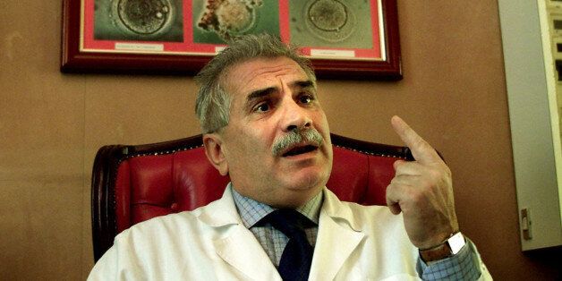 Italian fertility doctor Severino Antinori makes a point during an interview at his practice in Rome November 26, 2001. Antinori accused U.S. researchers, who have cloned a human embryo, of stealing his idea and said he would go ahead with plans to clone an embryo for reproductive purposes within six months. [Biotechnology firm Advanced Cell Technology Inc, (ACT) announced on Sunday it had cloned human embryos for therapeutic stem cell purposes.]