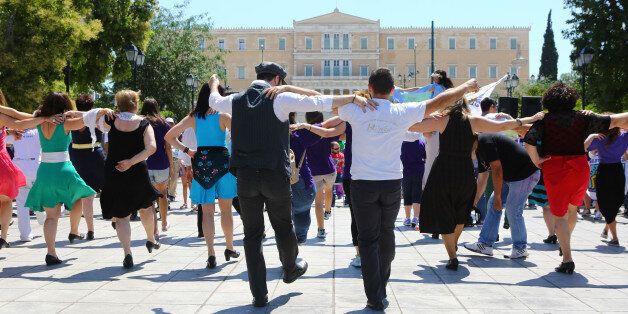ATHENS, GREECE - 2015/06/13: People dancing in Syntagma square.The Best Buddies of Greece organized a 'Friendship Walk' in Syntagma square in support of people with intellectual and developmental disabilities (IDD). (Photo by George Panagakis/Pacific Press/LightRocket via Getty Images)