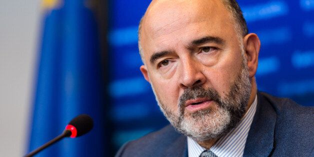 European Commissioner for Economic and Financial Affairs Pierre Moscovici addresses the media after a meeting of eurogroup finance ministers at the EU Council building in Luxembourg on Monday, Oct. 5, 2015. (AP Photo/Geert Vanden Wijngaert)