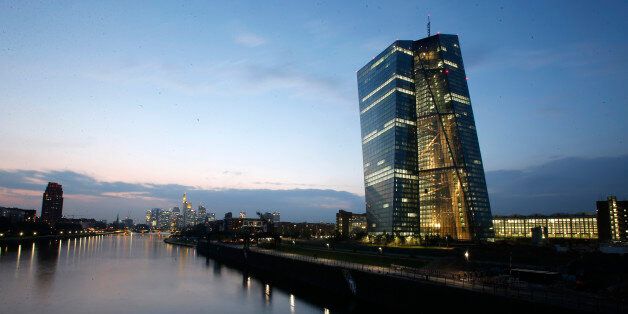 The new headquarters of the European Central Bank (ECB), building at right, under construction on the water front of the River Main in Frankfurt, Germany, Wednesday, Sept.24,2014. The ECB is supposed to move into the building by the end of 2014. (AP Photo/Michael Probst)
