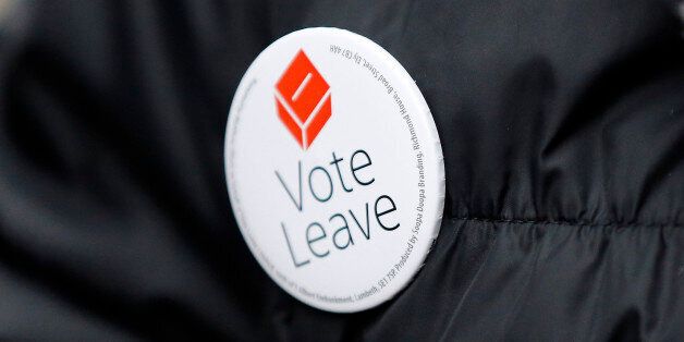 A Pro-Brexit campaigner hands out leaflets at Liverpool Street station in London, Wednesday, March 23, 2016. With less than three months to go until a June 23 referendum, Britain's anti-EU campaigners are bitterly divided, with two rival camps battling over which will be the standard-bearer in the campaign, and over how to win the historic vote. (AP Photo/Frank Augstein)