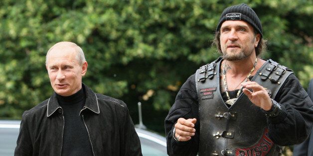 Russian Prime Minister Vladimir Putin, left, and leader of Nochniye Volki (the Night Wolves) biker group, Alexander Zaldostanov, also known as Khirurg (the Surgeon), right, seen during Putin's visit to the group's club in Moscow, Tuesday, July 7, 2009. Putin met Tuesday Russian bikers before their departure to the Ukraine's Crimean port of Sevastopol to take part in the upcoming 13th international motorbike show in support of Russia's Black Sea Fleet and marking the 65th anniversary of the city's liberation from Nazi Germany troops during the World War II.(AP Photo/RIA-Novosti, Alexei Druzhinin, Pool)(AP Photo/RIA-Novosti, Alexei Druzhinin, Pool)