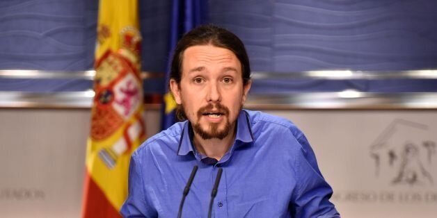 Leader of left wing party Podemos Pablo Iglesias gestures during a press conference at the Spanish parliament in Madrid on April 26, 2016.Spain was offered a glimmer of hope Tuesday after parties restarted coalition talks in a surprise, eleventh-hour move just as the deadline to form a government drew to a close and fresh elections threatened. / AFP / GERARD JULIEN (Photo credit should read GERARD JULIEN/AFP/Getty Images)