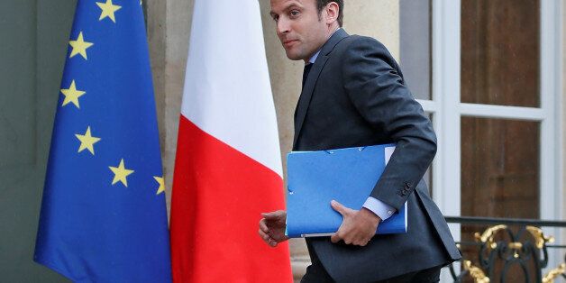 French Economy Minister Emmanuel Macron arrives to attend an extraordinay cabinet meeting about the labour reform law at the Elysee Palace in Paris, France, May 10, 2016. REUTERS/Gonzalo Fuentes
