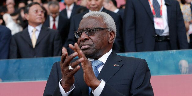 BEIJING, CHINA - AUGUST 22: Outgoing president of the IAAF Lamine Diack applauds during day one of the 15th IAAF World Athletics Championships Beijing 2015 at Beijing National Stadium on August 22, 2015 in Beijing, China. (Photo by Lintao Zhang/Getty Images for IAAF)