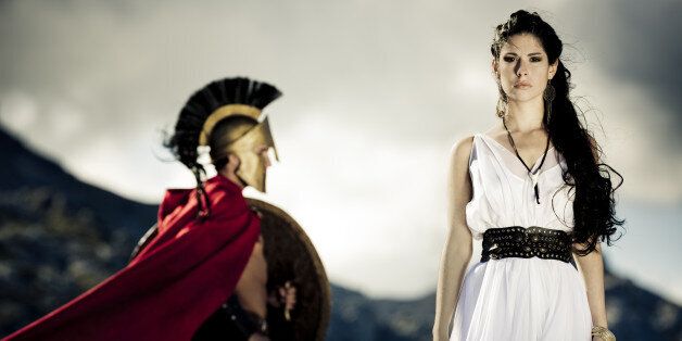 Portrait of spartan queen and spartan warrior with selfmade theater clothings,selective focus on her, very creative color retouching to underline the ancient time,vignetting, added noise,some areas with slightly overexposing