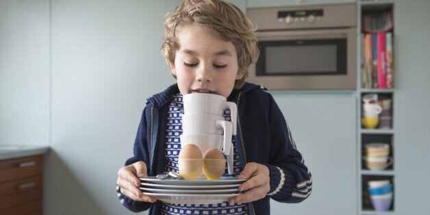 Child setting the table