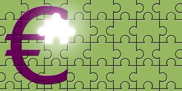 Euro sign on a puzzle with missing piece