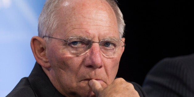 German Finance Minister Wolfgang Schauble listens during a press conference on 'Joint Action Against Tax Fraud and Money Laundering-Transparency at the Global Level,' during the IMF and World Bank Group 2016 Spring Meetings on April 14, 2016 in Washington, DC. / AFP / MOLLY RILEY (Photo credit should read MOLLY RILEY/AFP/Getty Images)