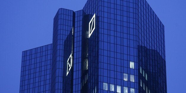 Headquarters of Deutsche Bank is photographed in Frankfurt, Germany, Thursday, Dec. 10, 2015. (AP Photo/Michael Probst)