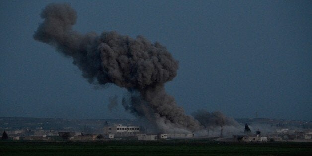 ALEPPO, SYRIA - APRIL 3: Smoke rises as the war-crafts belonging to the US-led coalition forces carry out airstrikes on Daesh terrorist organization's positions near the Tat village in Aleppo, Syria after Syrian opponents took control of three villages on April 3, 2016. (Photo by Huseyin Nasr/Anadolu Agency/Getty Images)