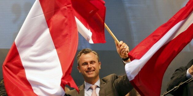 Austrian far right Freedom Party (FPOe) presidential candidate Norbert Hofer waves with Austrian flags during the final election rally in Vienna, Austria, April 22, 2016. REUTERS/Leonhard Foeger