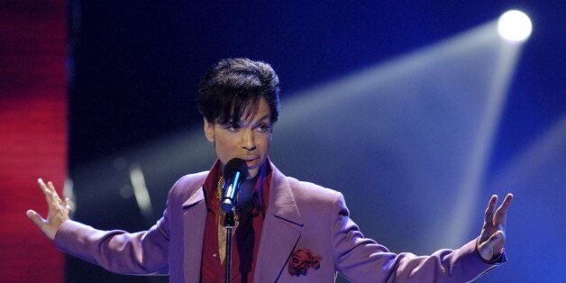 Singer Prince performs in a surprise appearance on the