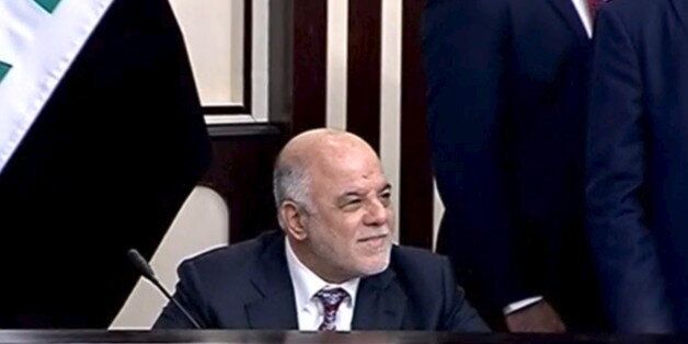 Iraq's Prime Minister Haider al-Abadi attends parliament in Baghdad, Iraq, in this still image from April 26, 2016 video footage. Iraqiya TV via Reuters TV/Handout via REUTERS ATTENTION EDITORS - THIS IMAGE WAS PROVIDED BY A THIRD PARTY. EDITORIAL USE ONLY. NO RESALES. NO ARCHIVE. TPX IMAGES OF THE DAY