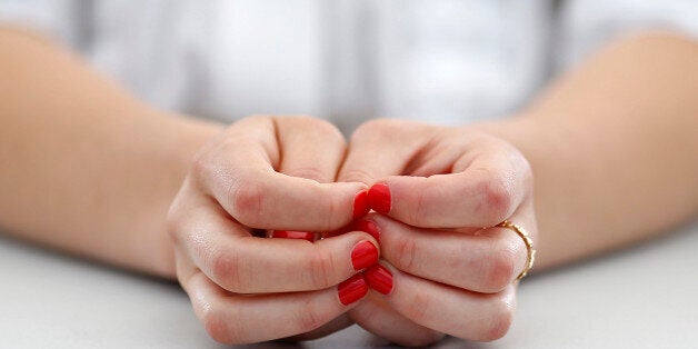 Cast member Anais Demoustier, with red painted nails, poses during a photocall for the film