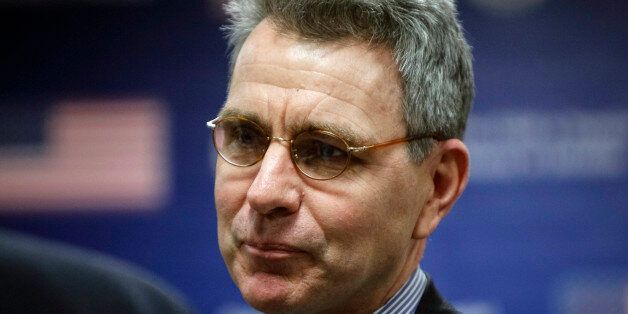 U.S. ambassador to Ukraine Geoffrey Pyatt is seen before U.S. Assistant Secretary of State Victoria Nuland's news conference at the U.S. embassy in Kiev February 7, 2014. Nuland, whose telephone conversation about the political crisis in Ukraine was leaked on the Internet, said on Friday that the recording was
