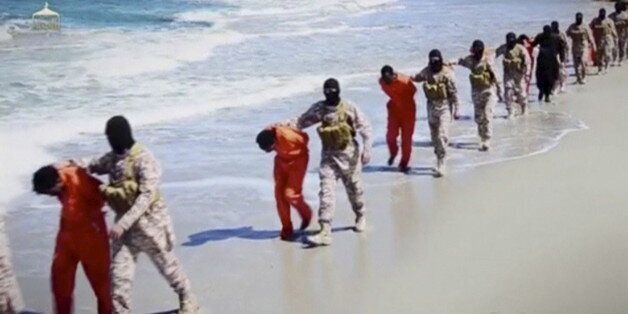 Islamic State militants lead what are said to be Ethiopian Christians along a beach in Wilayat Barqa, in this still image from an undated video made available on a social media website on April 19, 2015. The video purportedly made by Islamic State and posted on social media sites on Sunday appeared to show militants shooting and beheading about 30 Ethiopian Christians in Libya. Reuters was not able to verify the authenticity of the video but the killings resemble past violence carried out by Islamic State, an ultra-hardline group which has expanded its reach from strongholds in Iraq and Syria to conflict-ridden Libya. Libyan officials were not immediately available for comment. Ethiopia said it had not been able to verify whether the people shown in the video were its citizens. REUTERS/Social Media Website via Reuters TVATTENTION EDITORS - THIS PICTURE WAS PROVIDED BY A THIRD PARTY VIDEO. REUTERS IS UNABLE TO INDEPENDENTLY VERIFY THE AUTHENTICITY, CONTENT, LOCATION OR DATE OF THIS IMAGE. THIS PICTURE IS DISTRIBUTED EXACTLY AS RECEIVED BY REUTERS, AS A SERVICE TO CLIENTS.