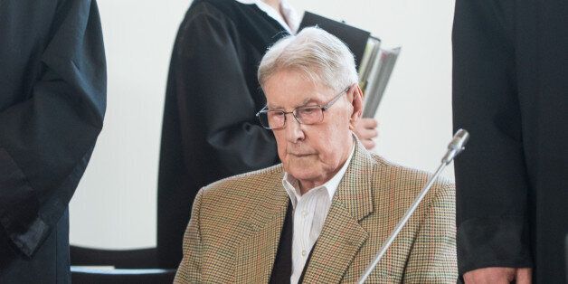 Former Auschwitz guard Reinhold Hanning is seen in court waiting for the continuation of his trial at the court in Detmold, western Germany,on April 28, 2016.The 94-year-old former Auschwitz guard is on trial for complicity in the murders of tens of thousands of people at the Nazi concentration camp. / AFP / POOL / Bernd Thissen (Photo credit should read BERND THISSEN/AFP/Getty Images)