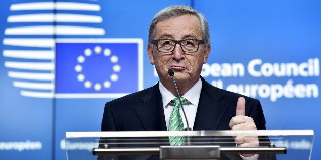 European Commission President Jean-Claude Juncker gestures during a news conference after the second day of a European Union leaders' summit addressing the talks about the so-called Brexit and the migrants crisis in Brussels, Belgium, February 19, 2016. REUTERS/Eric Vidal TPX IMAGES OF THE DAY