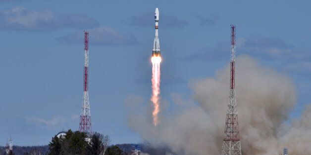 A Russian Soyuz 2.1a rocket carrying Lomonosov, Aist-2D and SamSat-218 satellites leaves a trail of smoke as it lifts off from the new Vostochny cosmodrome outside the city of Uglegorsk, about 200 kilometers (125 miles) from the city of Blagoveshchensk in the far eastern Amur region Thursday, April 28, 2016. (Kirill Kudryavtsev/Pool Photo via AP)