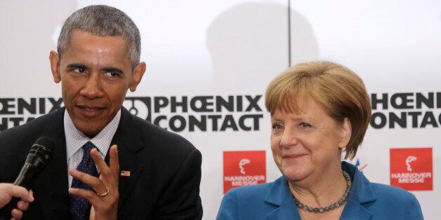 U.S. President Barack Obama and German Chancellor Angela Merkel, right, tour the Hannover Messe, the world's largest industrial technology trade fair, in Hannover, northern Germany, Monday, April 25, 2016. Obama is on a two-day official visit to Germany. (AP Photo/Markus Schreiber)