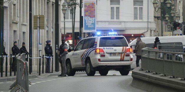 Police block the street outside the council chamber in Brussels, where two terrorism cases will behind closed doors, on March 31, 2016.The court will have to decide whether Yassine A., Mohamed B. and Aboubaker O., suspected to be involved in the Brussels explosions, will remain lodged in jail. It will also be decided if Salah Abdeslam, suspect in the Paris attacks, will be extradited to be judged in France. / AFP / BELGA AND Belga / STR / Belgium OUT (Photo credit should read STR/AFP/Getty Images)