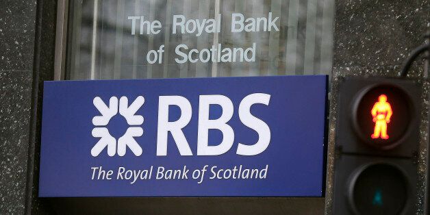 A logo of a branch of the Royal Bank of Scotland in London, Friday, Feb. 26, 2016. Royal Bank of Scotland, which is around 73 percent owned by the taxpayers, racked up its eighth year in a row of annual losses, and Shares plunged 9 percent in London on the news. (AP Photo/Frank Augstein)