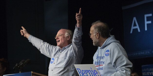 Jerry Greenfield, right, and Ben Cohen, co-founders of Ben & Jerry's Homemade Holdings Inc., introduce Senator Bernie Sanders, an independent from Vermont and 2016 Democratic presidential candidate, not pictured, during a campaign event in Exeter, New Hampshire, U.S., on Friday, Feb. 5, 2016. Democratic Party officials in Iowa say they can't do a recount of Monday's razor-thin presidential caucus results between Hillary Clinton and Sanders, even if they thought it was appropriate. And both candidates, in their debate later Thursday night, said it was no big deal. Photographer: Victor J. Blue/Bloomberg via Getty Images