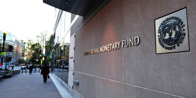 The International Monetary Fund (IMF) building sign is viewed on April 5, 2016 in Washington, DC.This years Spring Meetings events will take place in Washington, DC, April 12-17, 2016. Thousands of government officials, journalists, civil society organizations, and participants from the academia and private sectors, gather in Washington DC for the Spring Meetings of the International Monetary Fund and the World Bank Group. / AFP / Karen BLEIER (Photo credit should read KAREN BLEIER/AFP/G