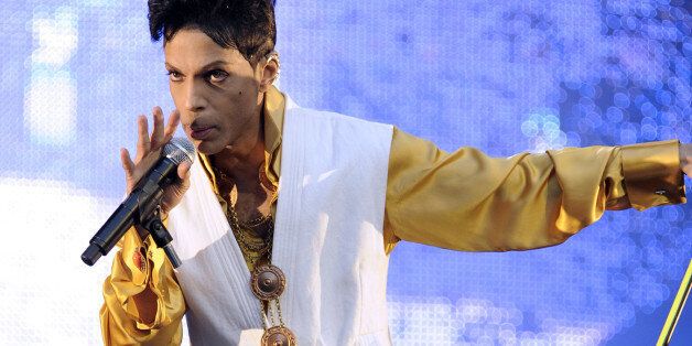 US singer and musician Prince (born Prince Rogers Nelson) performs on stage at the Stade de France in Saint-Denis, outside Paris, on June 30, 2011. AFP PHOTO BERTRAND GUAY (Photo credit should read BERTRAND GUAY/AFP/Getty Images)